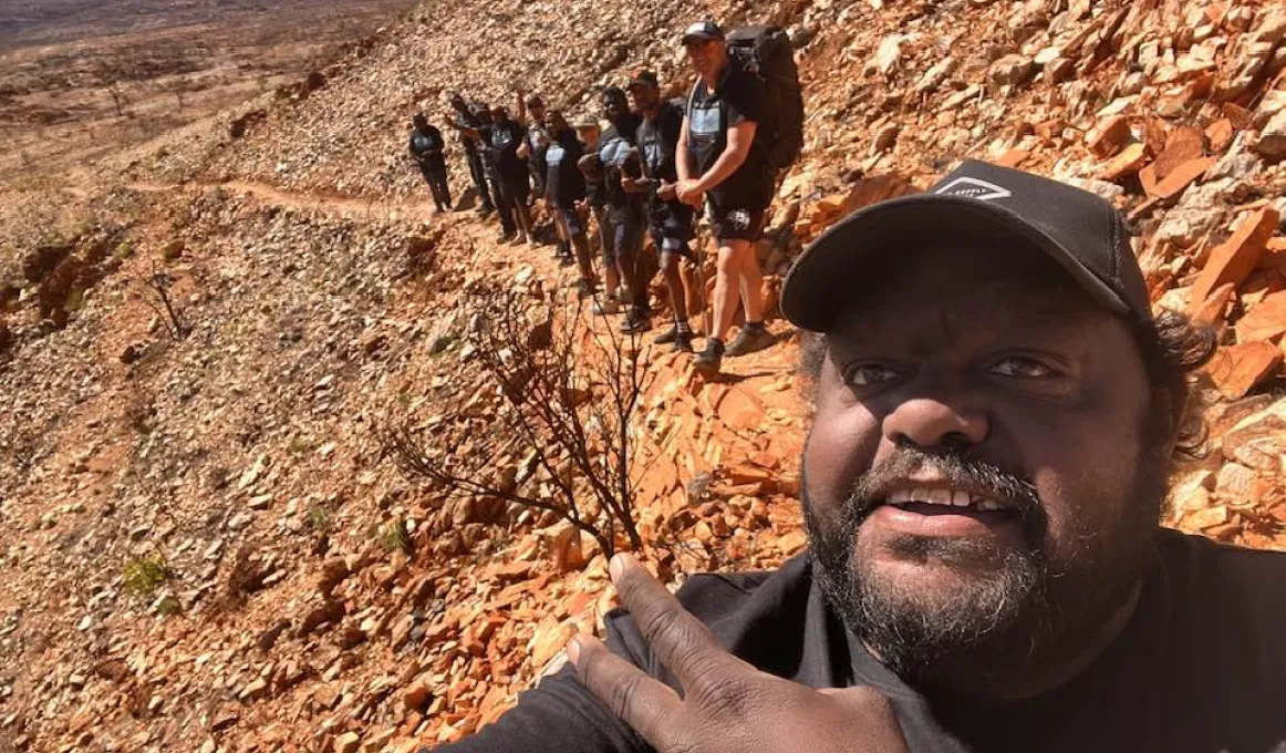 Benji Kenny takes a selfie with the team