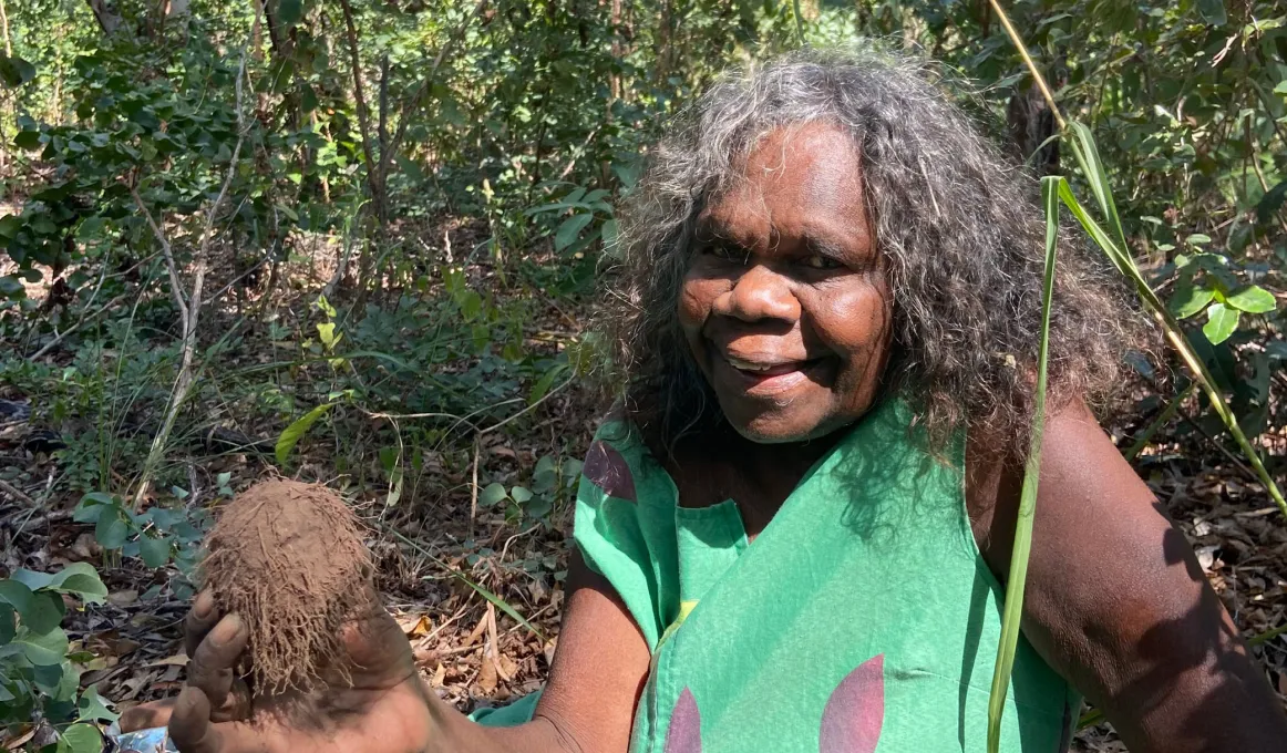 Millie Mamarika finding yams on the women's business camp for girls.