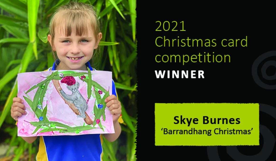 Skye Burnes holding her winning design titled ‘Barrandhang Christmas’.