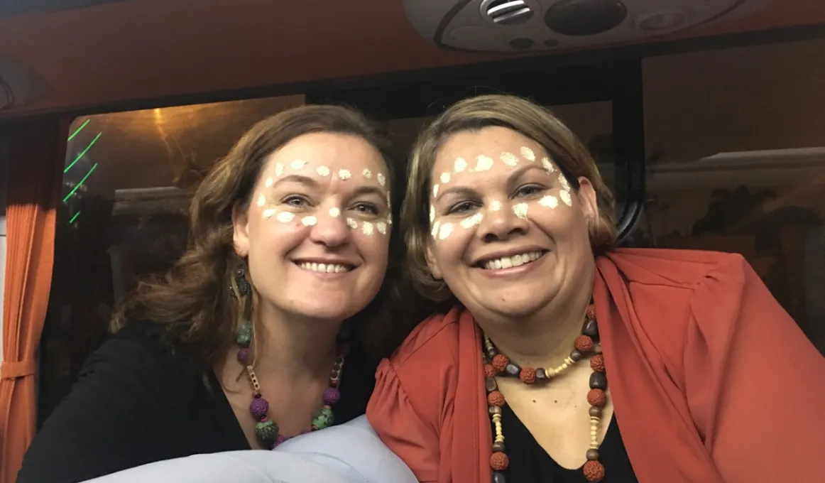 Beth Hall (left) and Dorinda Cox (right) celebrating as part of the APEC Women and the Economy forum’s cultural exchange.