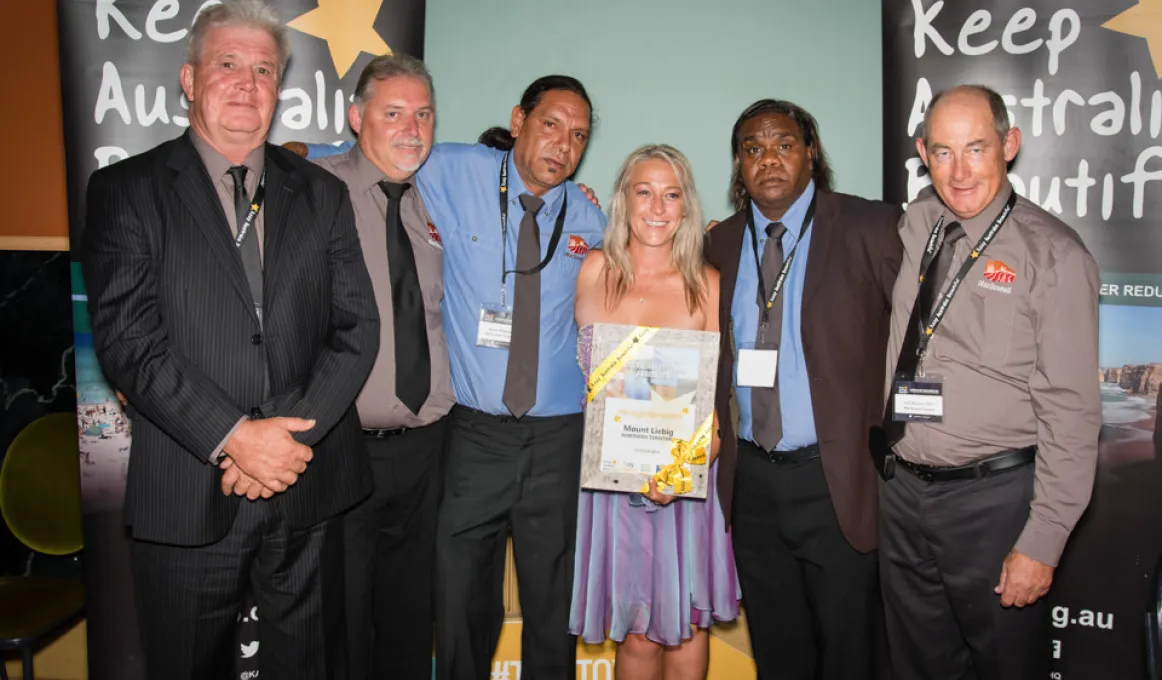 Melvin Malbunka, Chairperson of the Mount Liebig Local Authority (third from left) and Essential Services Operator Jeffrey Wheeler (second from right) with MacDonnell Regional Council staff celebrating Mt Liebig being awarded the inaugural Special Commend