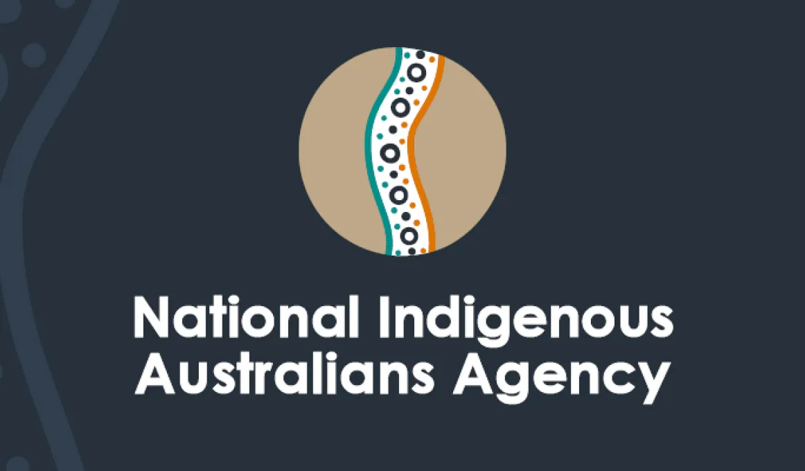 Poster with Indigenous design in a tan disc on a dark blue background. Words at base are: National Indigenous Australians Agency.