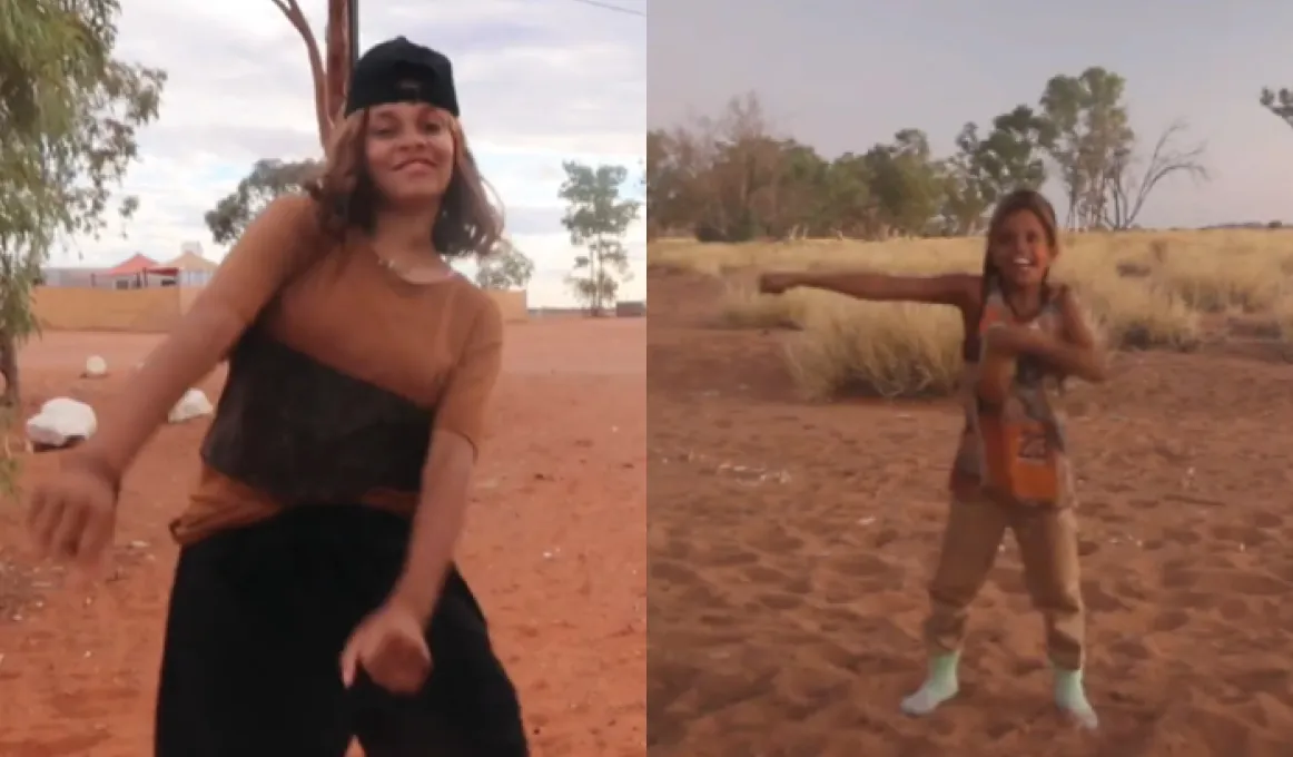 Two images side by side. At left, a young woman in brown top and black shorts, stands on red soil. In the background are trees and a cloudy sky. At right is a young boy in colourful top and brown trousers standing on brown soil with trees and grass beyond