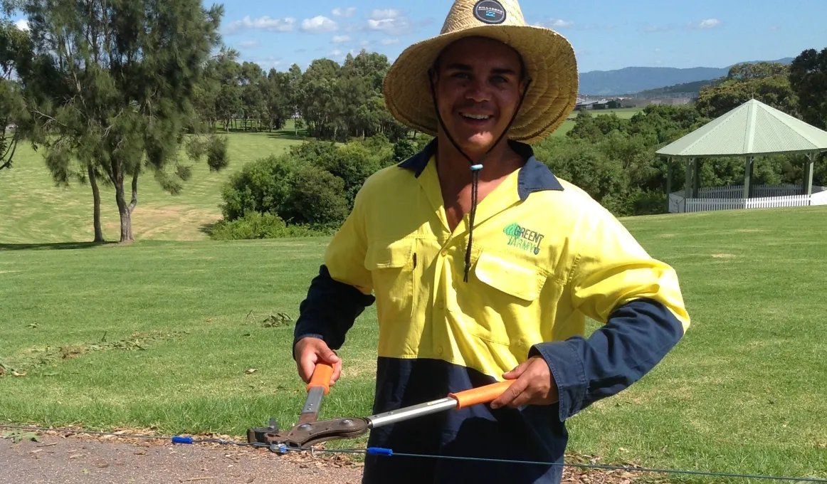 Paul Rymer fixing a fence