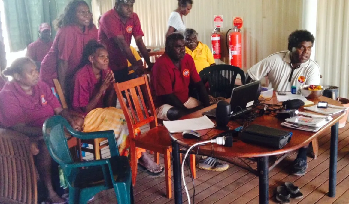 A photo of a group of school attendance officers in a room