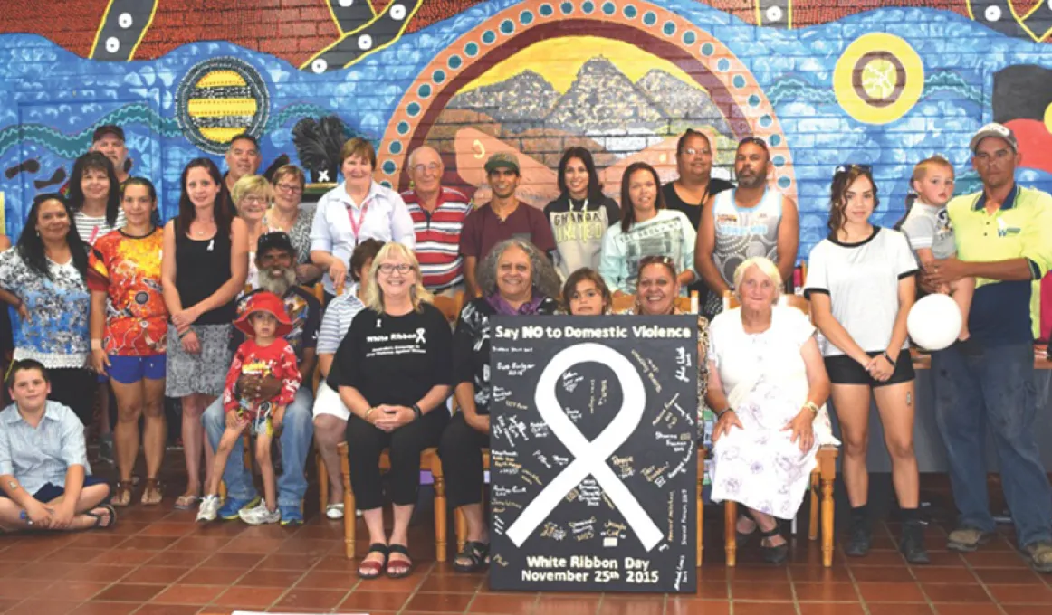 Image of Tumut locals gathered together at the White Ribbon Day event