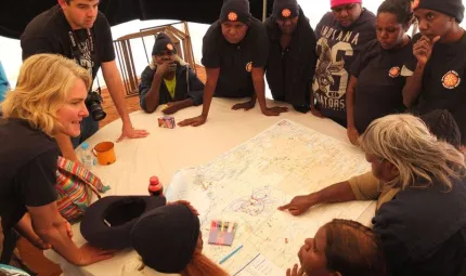 KJ and Birriliburru Women Rangers working together to map areas where Bilbies are located.