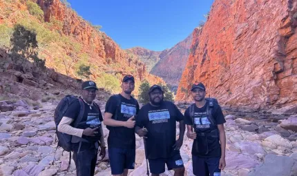 100% Finke River Culture and Adventures team on a trek