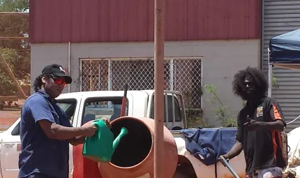 Milingimbi locals Robert Yurrkrrwuy and Jason Wanambi on the job at a construction site.