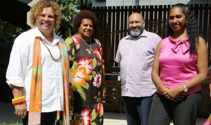 Three Indigenous women and one Indigenous man stand together outside, at the launch of the Torres Strait and Kaurareg Aboriginal Peoples’ Healing Strategy.