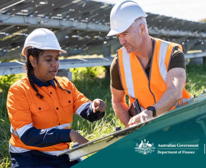 Two workers discussing