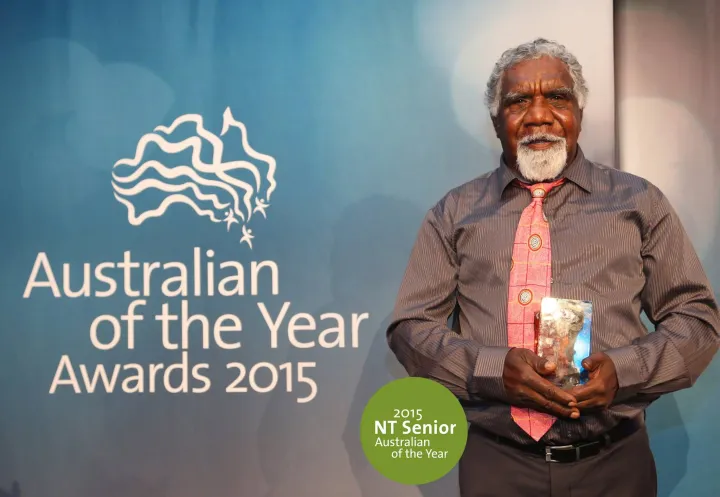 Eddie Robertson, pictured holding his award for the 2015 Northern Territory Senior Australian of the Year!