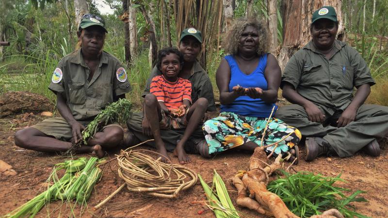 Working on Country winning photograph, by the Djelk Ranger group from Maningrida in central Arnhem Land, shows Traditional Owner Leila Nimbadja sharing conservation knowledge with the Djelk Women Rangers.