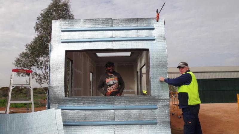 Colebrook CDP participant Kerwin Moore and Jason Marriott during the aquaponics project construction phase.