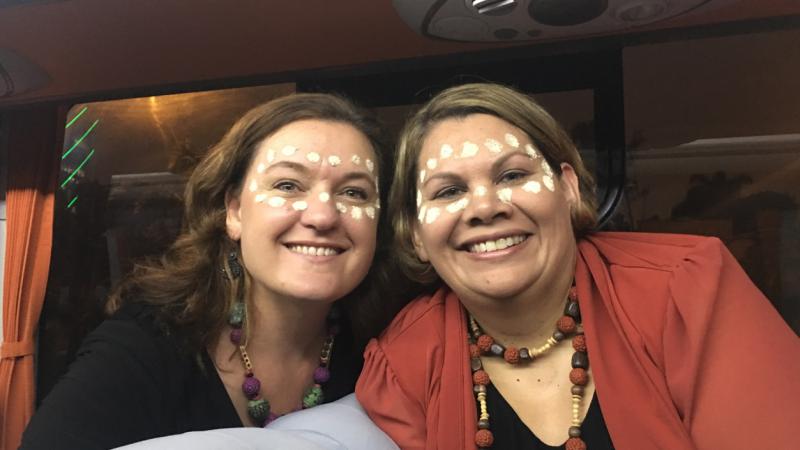 Beth Hall (left) and Dorinda Cox (right) celebrating as part of the APEC Women and the Economy forum’s cultural exchange. 