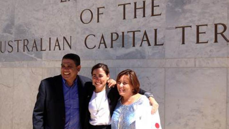 Mark Ella with his wife Kim and daughter Nicole. Nicole has recently been accepted as a practising solicitor by the Supreme Court in Canberra.