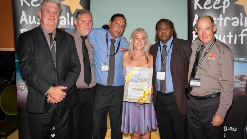 Melvin Malbunka, Chairperson of the Mount Liebig Local Authority (third from left) and Essential Services Operator Jeffrey Wheeler (second from right) with MacDonnell Regional Council staff celebrating Mt Liebig being awarded the inaugural Special Commend