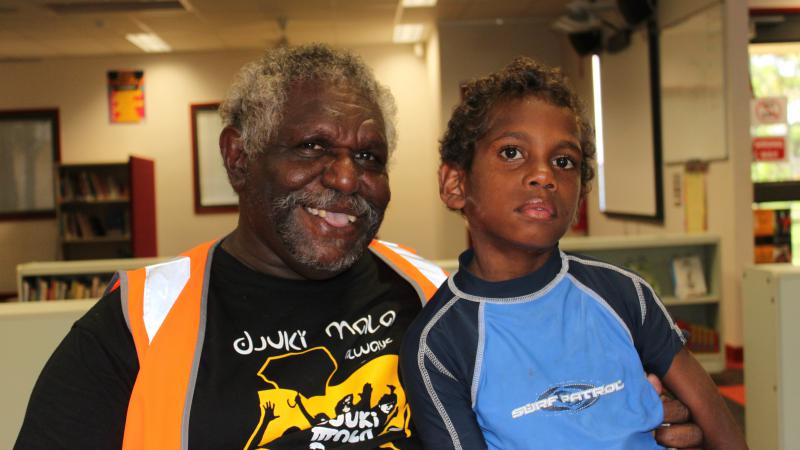 Mornington Island School Attendance Officer Leon Roughsey with his grandson Graham.