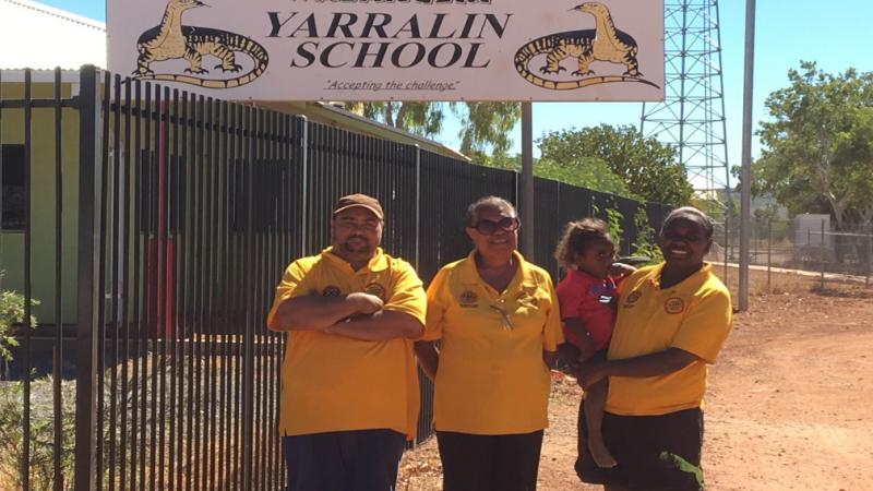 Yarralin Remote School Attendance Team: L-R; Simon Campbell, Frances Rosas and Jasmin Campbell (SAO), with Jasmin’s daughter, Ameera.