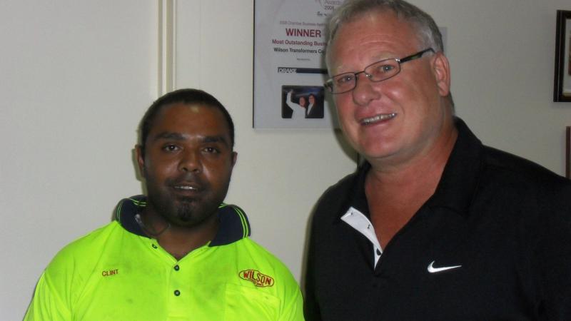 Wilson Transformer Company Aboriginal Youth Development Program graduate Clint Johnson with company general manager Jon Retford.