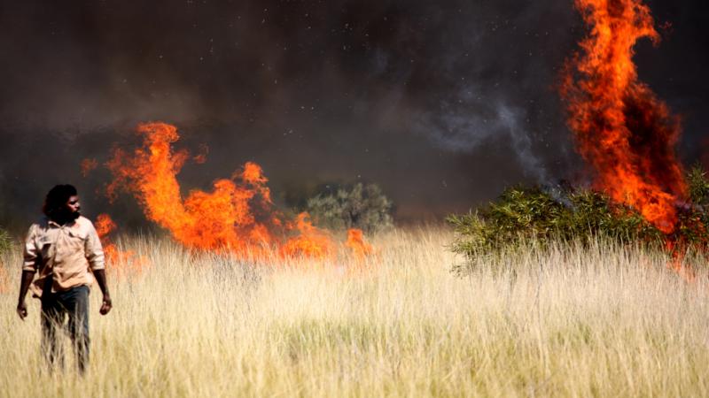 World Indigenous Network photo competition finalist - Jigalong Rangers out burning country to bring it back to life. Photo: Tim Schneider.