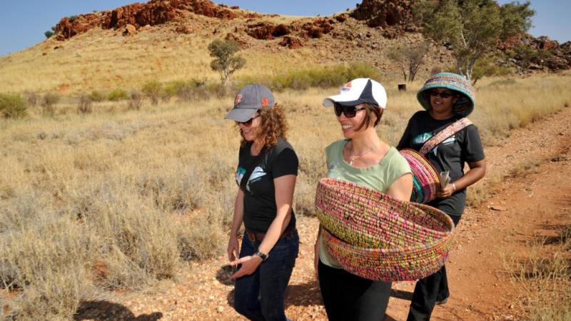 Reconciliation Australia CEO Leah Armstrong with Gabrielle Sullivan and Kathleen Sorensen from Martumili Artists, Parngurr, WA. Photo: Wayne Qulliam.