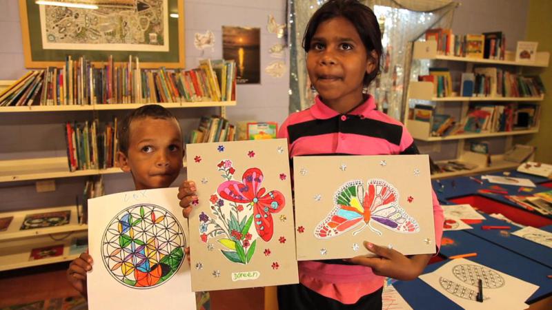 Lex Bowen and Doreen Rankine show-off their artwork at the Indigenous Knowledge and Technology Centre, Hope Vale, QLD.