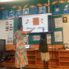 First year primary school teacher Tayha Duggan-Hill with students in Maningrida, NT