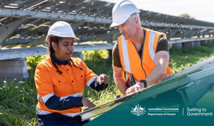 Two workers discussing