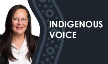 Words 'Indigenous Voice' appear on a dark grey background with wavy blue, black and white lines with dots and circles. At left side there is an image of woman with long black hair, glasses and wearing a white shirt and black jacket